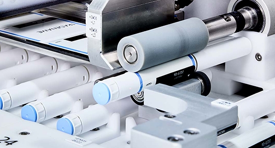 Pharmaceutical labelling machine